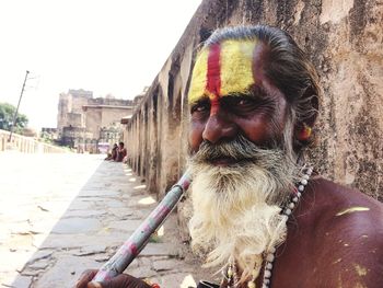 Portrait of man on street