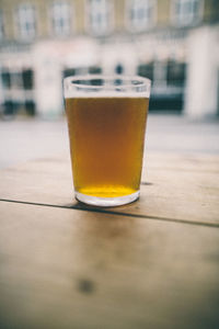 Close-up of beer on table