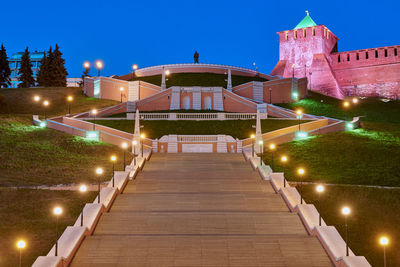 View of illuminated building against sky at night