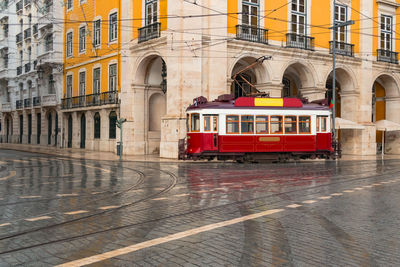 Red car on city street