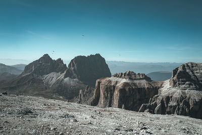 Scenic view of mountains against clear blue sky