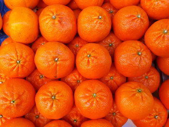 Full frame shot of oranges at market stall