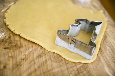 High angle view of bread on cutting board
