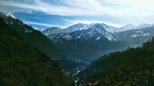 Scenic view of mountains against sky during winter