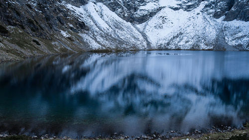 Czarny staw pod rysamy or black pond lake near the morskie oko snowy mountain hut in polish tatry