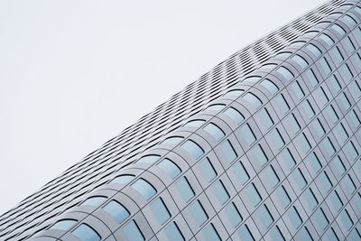 Low angle view of skyscraper against clear sky