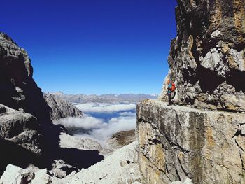 Scenic view of mountains against clear blue sky