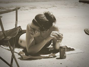 Woman standing on beach