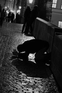 People standing on pavement