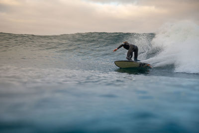 Man surfing in sea