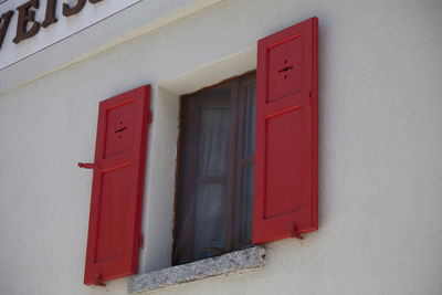 Red closed door of building