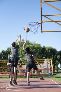 Teenagers street basketball team