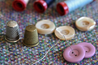 High angle view of various buttons on table