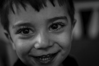 Close-up portrait of smiling boy