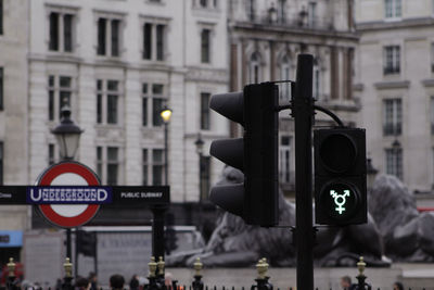 Road sign on street in city