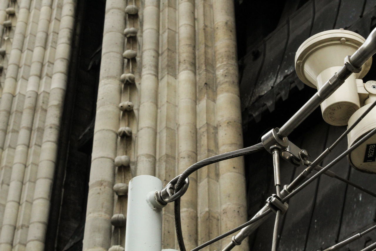 LOW ANGLE VIEW OF PIPE ON METAL STRUCTURE