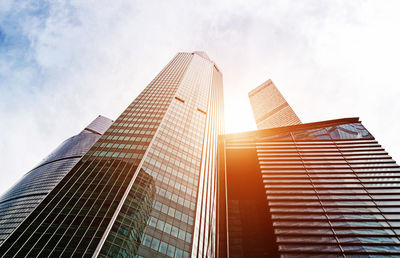 Low angle view of modern buildings against sky