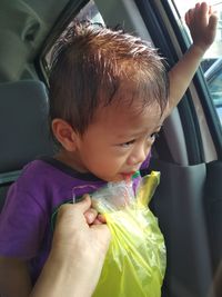 Cute boy in car