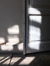 Sunlight falling on wall of building