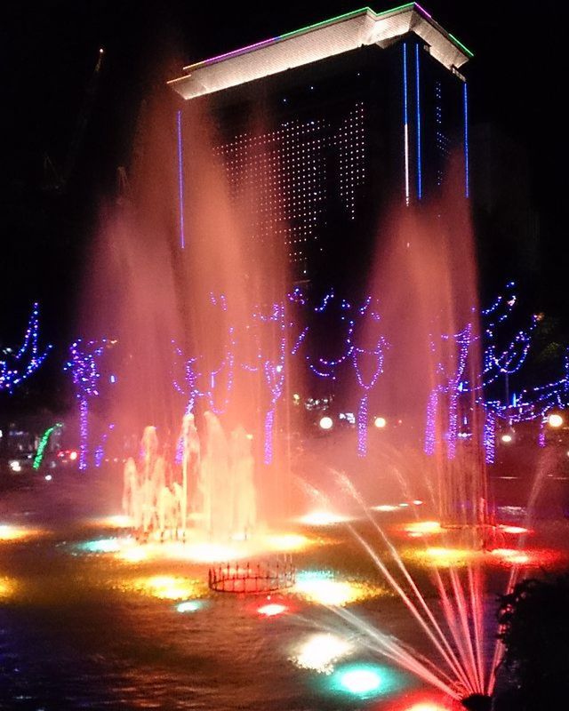 illuminated, night, long exposure, motion, firework display, celebration, blurred motion, multi colored, exploding, glowing, arts culture and entertainment, sparks, building exterior, firework - man made object, event, light trail, firework, light - natural phenomenon, lighting equipment, city