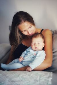 Mother and baby girl at home