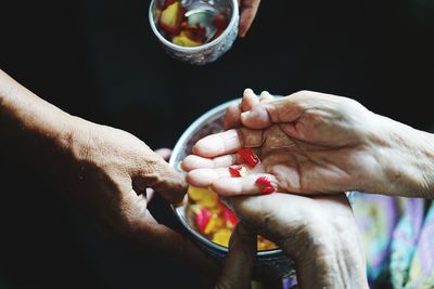 Close-up of hand holding hands