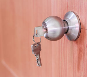 Close-up of key in doorknob