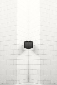 Low angle view of clock on wall