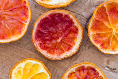 Directly above view of fresh fruits on wooden table