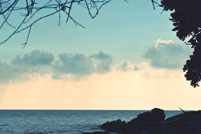 Scenic view of sea against sky at sunset