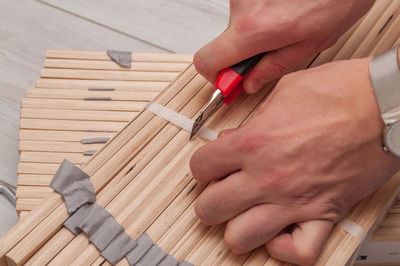 Midsection of woman working on table