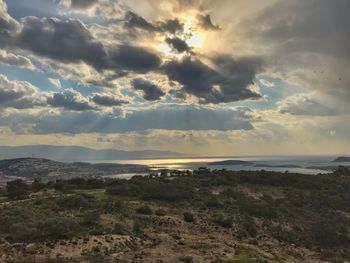 Scenic view of landscape against sky during sunset