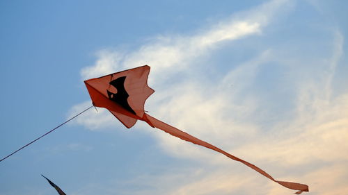 Low angle view of flag against sky