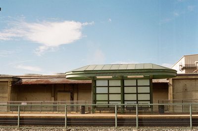 Low angle view of building against blue sky