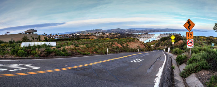 Road in city against sky