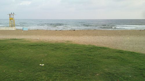 Scenic view of beach against sky