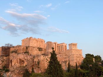 Low angle view of ancient buildings against sky