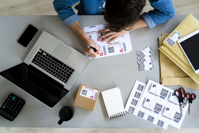 High angle view of mobile phone on table