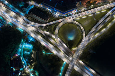 High angle view of light trails in city at night