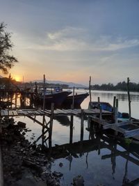 View of harbor at sunset