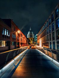 Buildings in city at night