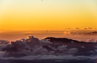 Scenic view of dramatic sky during sunset