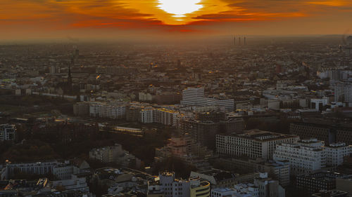 Aerial view of city at sunset