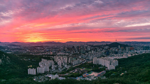 High angle view of townscape against sky during sunset