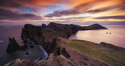 Scenic view of sea against sky at sunset