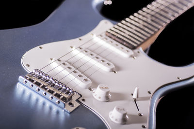 Cut tight macro of a electric guitar