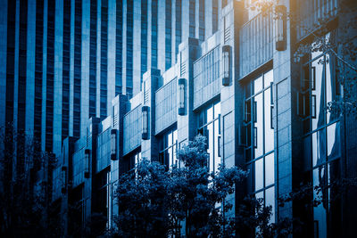 Low angle view of modern buildings in city