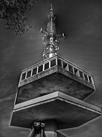 Low angle view of ferris wheel against sky