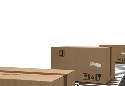 Cardboard boxes against white background