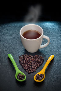 High angle view of coffee cup on table